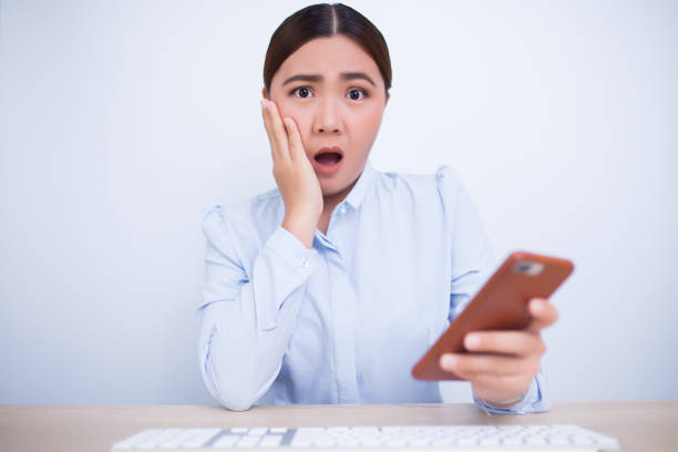 istock Woman play the  smartphone and surprise 669508920