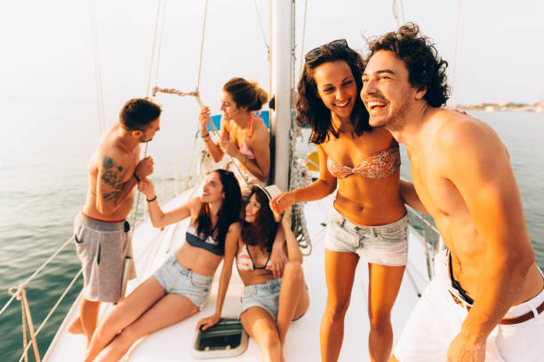 istock Happy friends on a yacht 669509254