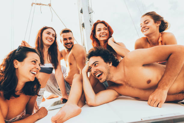 istock Happy friends on a yacht 669509508