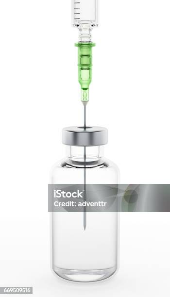 Syringe Needle Inside Medicine Bottle Stock Photo - Download Image Now - Syringe, Vial, Bottle