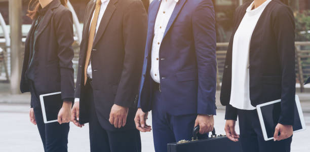 istock Business people standing in a row 669512670