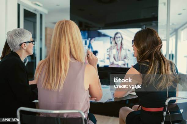 Women On Conference Call Stock Photo - Download Image Now - Office, Web Conference, Teamwork