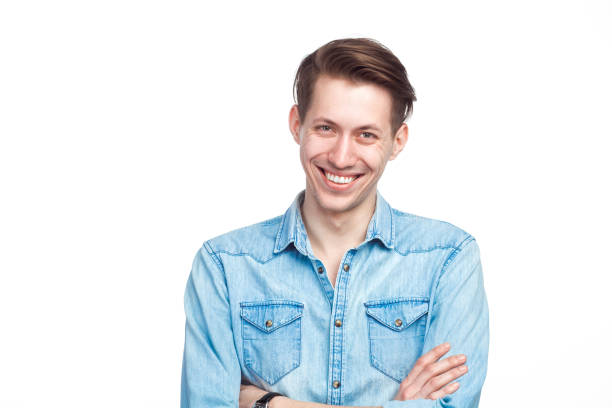 istock Young male laughing in studio 669513316