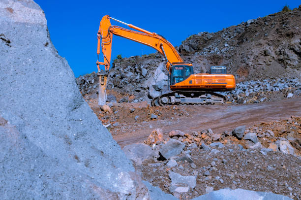 istock The excavator in mine 669521160