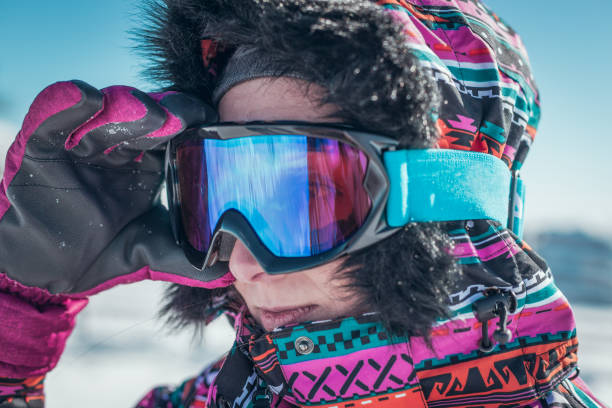 istock Young female skier with goggles 669524096