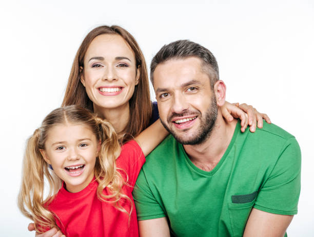 istock Parents with little daughter at camera 669525252