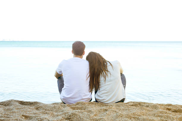 istock Couple on the beach 669533586