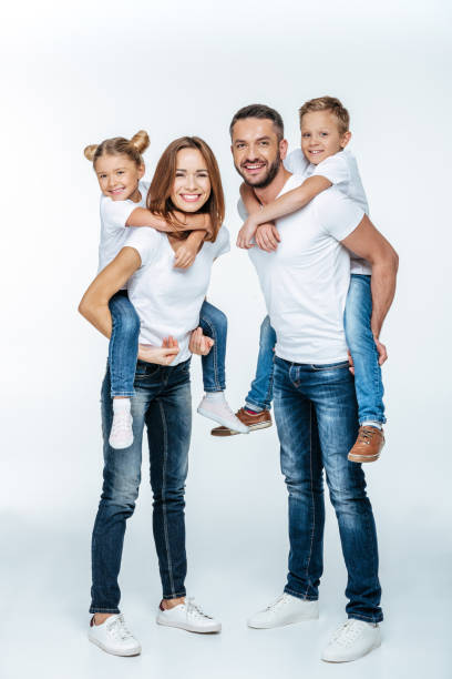 istock Parents piggybacking happy children 669534182