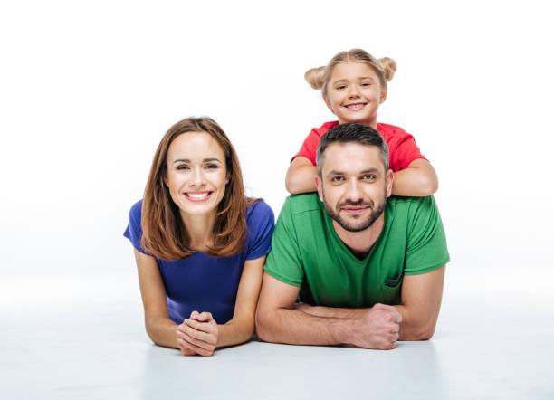 istock Smiling parents with cute little daughter 669537928