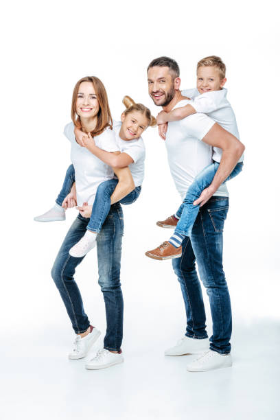 istock Parents piggybacking happy children 669538010