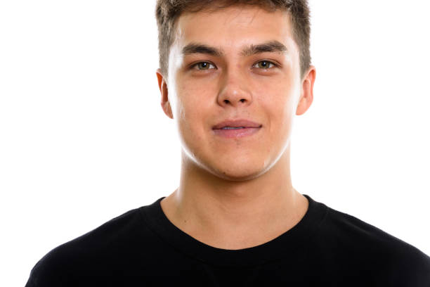 istock Close up of young handsome man against white background 669544472