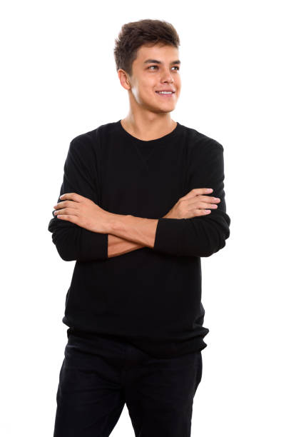 istock Studio shot of young happy man smiling while thinking with arms crossed 669544510