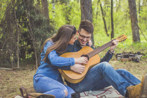 istock Love and music in the park 669551526