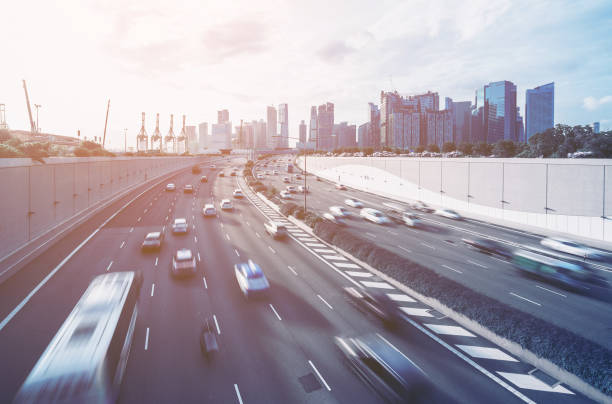 istock Busy road and city background during rush hour 669555162