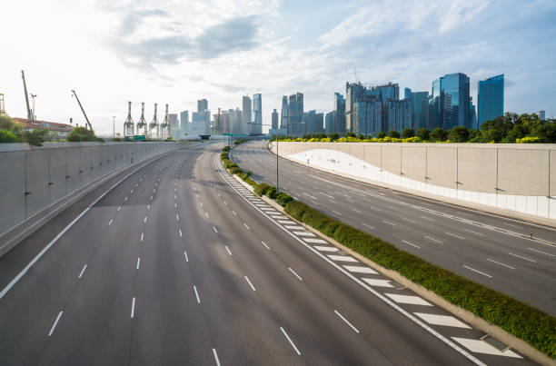 istock Empty road background in the modern city 669555176