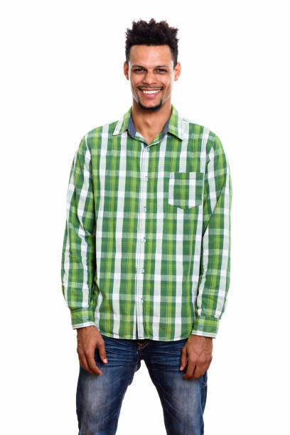 istock Studio shot of young happy African man smiling while standing 669558688