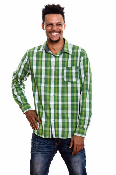 istock Studio shot of young happy African man smiling while thinking and posing 669558776