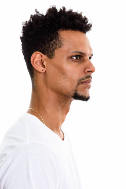 istock Profile view of young African man thinking while looking at distance 669559700