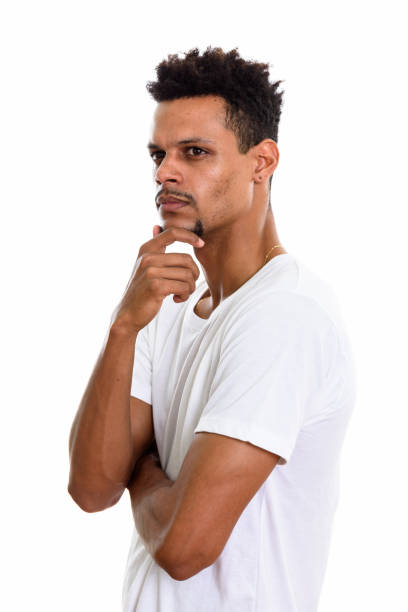 istock Studio shot of young African man thinking while looking to the side 669559704