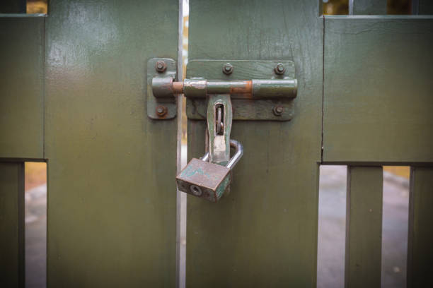 istock Lock on the gate, shadow vintage or retro style 669565882