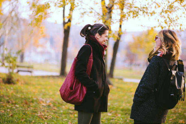 istock Girlfriends Having Fun In a Park On Sunny Day 669570182