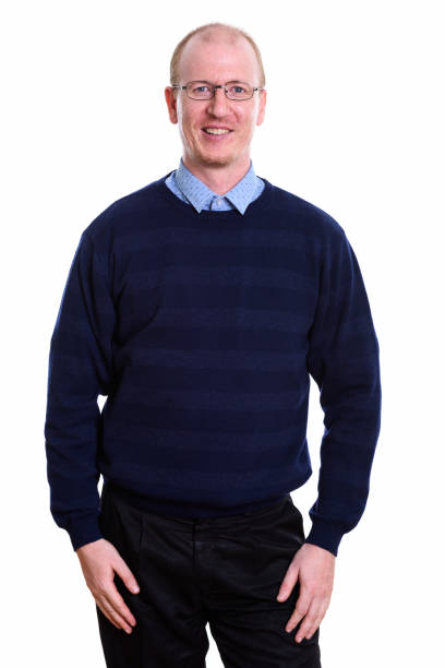 istock Studio shot of happy man smiling and standing 669570418