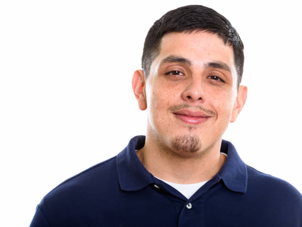 istock Close up of young Hispanic man looking at camera 669574652