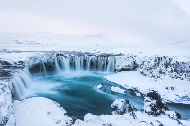 istock Beautiful winter Godafoss waterfall in Iceland, covered in snow, 669574670