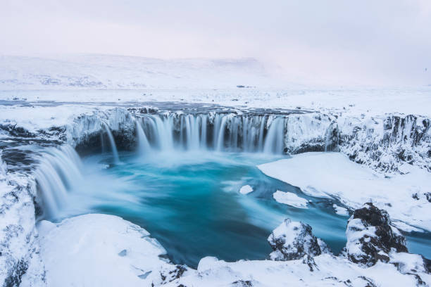 istock Beautiful winter Godafoss waterfall in Iceland, covered in snow, 669574692
