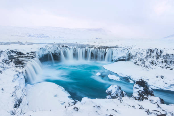 istock Beautiful winter Godafoss waterfall in Iceland, covered in snow, 669576896