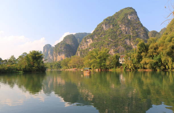 istock Bamboo rafting karst mountain landscape Yangshou China 669580052