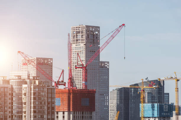 istock Large Construction Site with Cranes in City 669580576