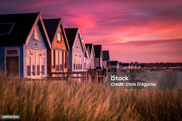 Hengistbury Head Beach Huts At Sunrise Stock Photo - Download Image Now - Bournemouth - England, Beach Hut, Beach
