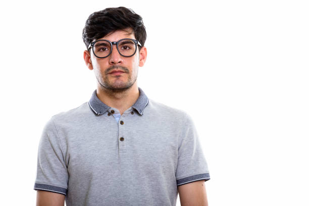 istock Studio shot of young Persian man wearing eyeglasses 669587848