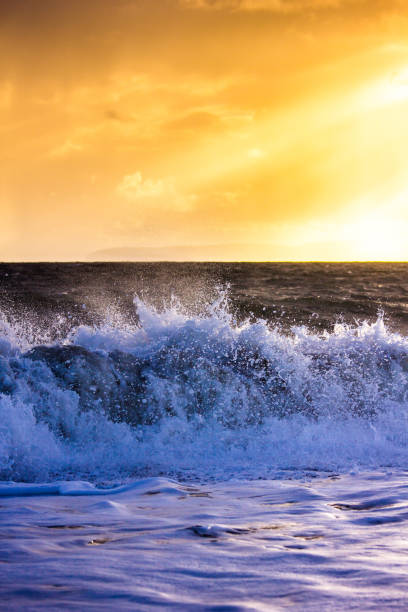 Waves Crash Onto the Beach at Hengistbury Head in a Dramatic Winter Storm