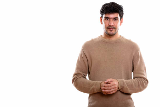 istock Studio shot of young Persian man against white background 669589040