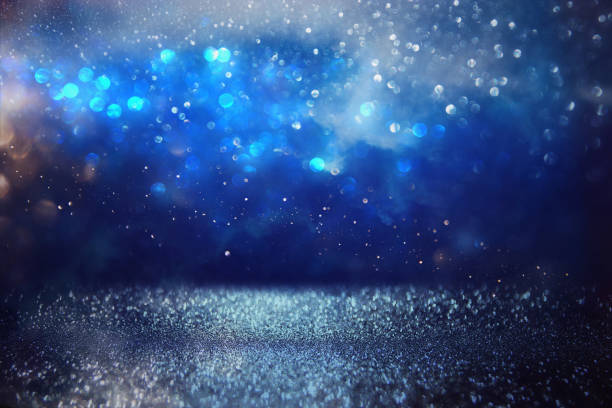 istock glitter vintage lights background. defocused 669591368