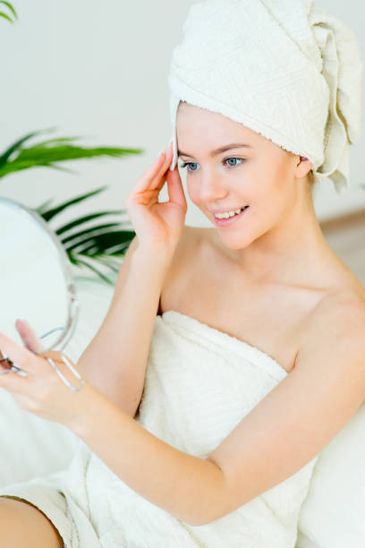 istock Woman applying a cream 669594028