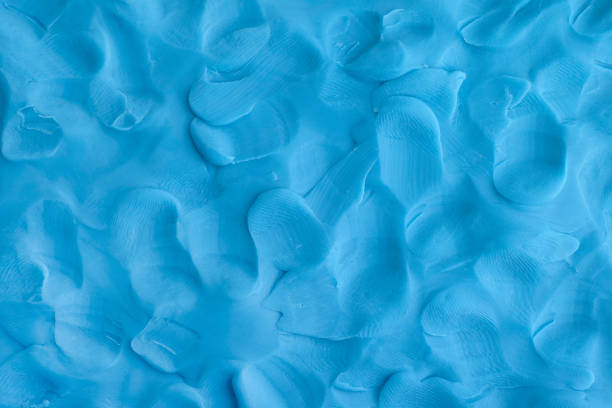 Play clay blue background texture Play clay blue background texture. Close up. childs play clay stock pictures, royalty-free photos & images