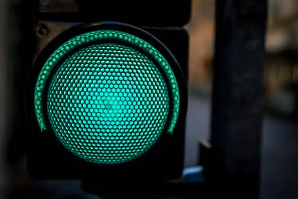 Closed up shot of green traffic light as ready to go concept