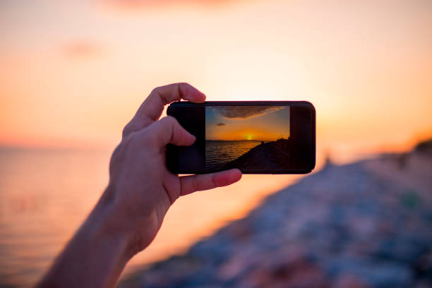 istock Take a photo on the beach 669604378