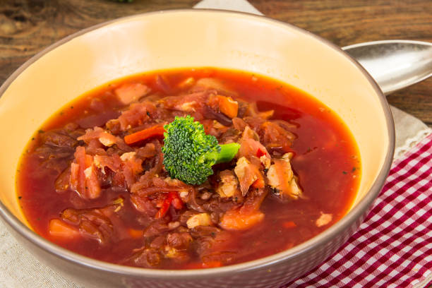 Vegetarian vegetable soup with beet, broccoli and tomatoes