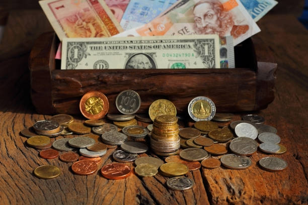 istock Internation money coins and baknotes with bussiness. 669614408