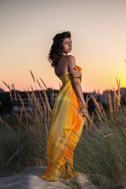 istock Young girl on the beach 669617012