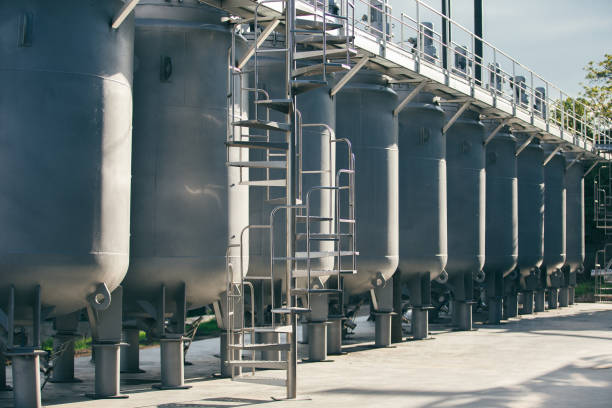 istock Wine factory tanks outside 669620984