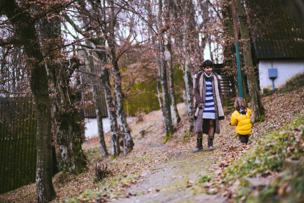 istock Mother And Son walking In Hills 669625338