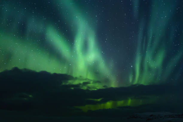 istock Northern lights. Aurora borealis nature landscape at night 669628640