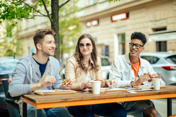 istock Friends spending time together in the city 669634696
