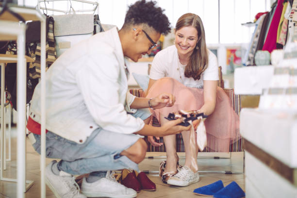 istock Young woman shopping shoes 669634902