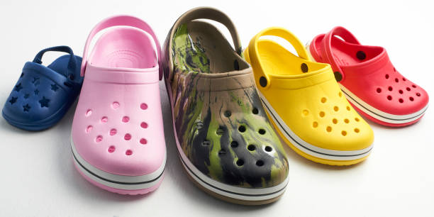 A group of casual clog shoes A group of casual clog shoes crocodile photos stock pictures, royalty-free photos & images